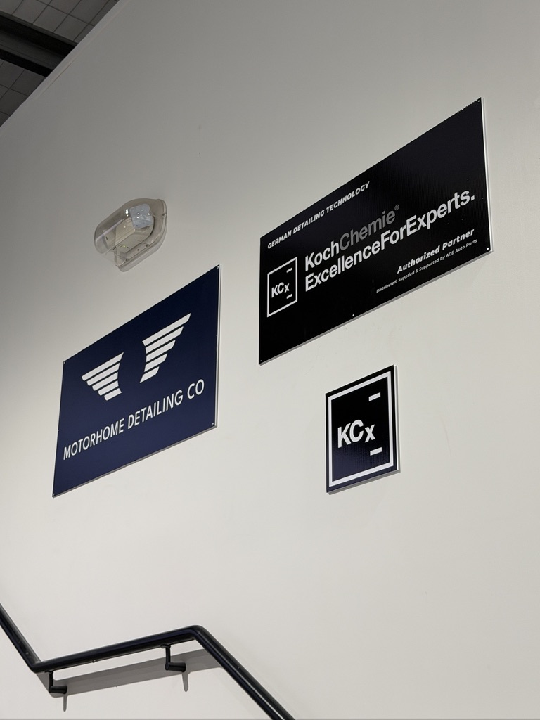 Motorhome Detailing Co signage alongside Koch-Chemie Excellence For Experts authorised partner plaque